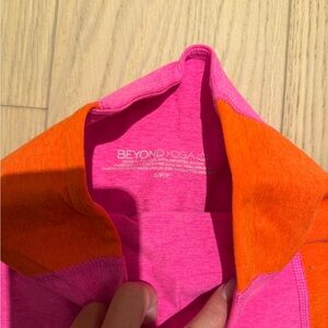 Beyond Yoga Bright Pink and Orange Leggings